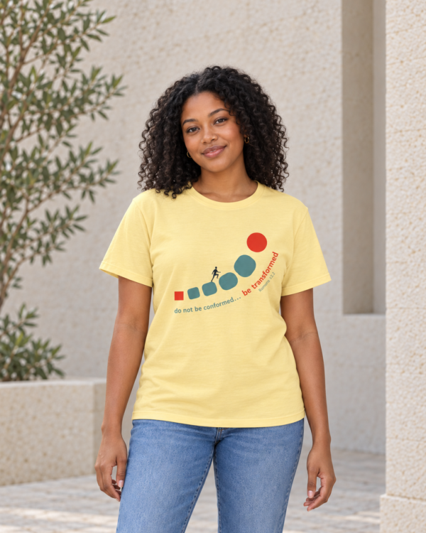 courtyard portrait in a yellow shirt